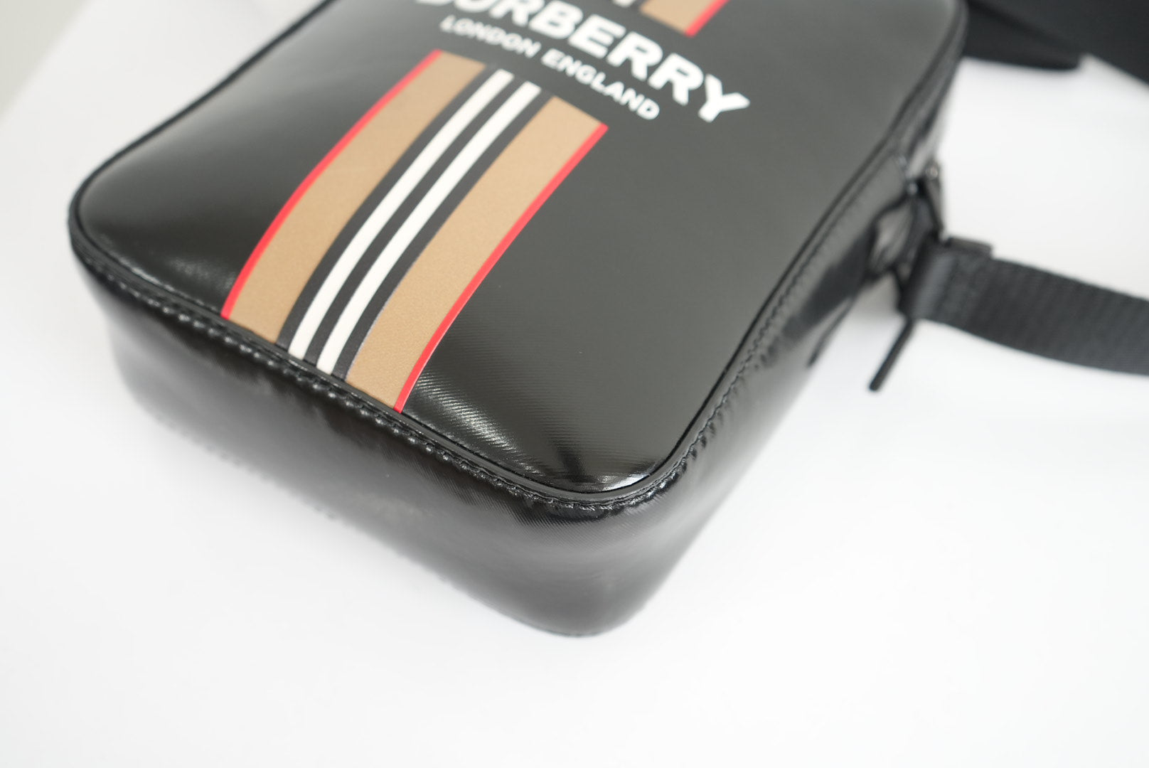 Burberry Thornton logo-stripe coated-canvas cross-body bag in black