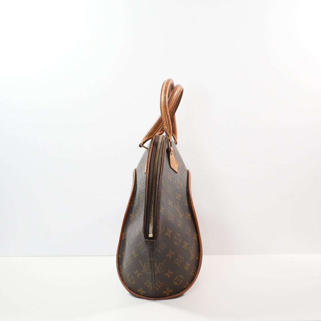 Louis Vuitton Ellipse handbag in monogram brown in distinctive rigid curved sihouette (dustbag)
