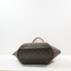Louis Vuitton Ellipse handbag in monogram brown in distinctive rigid curved sihouette (dustbag)