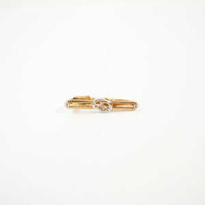 Christian Dior Interlocked two toned clip on brooch