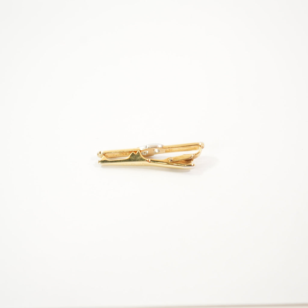 Christian Dior Interlocked two toned clip on brooch