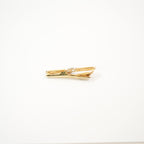 Christian Dior Interlocked two toned clip on brooch
