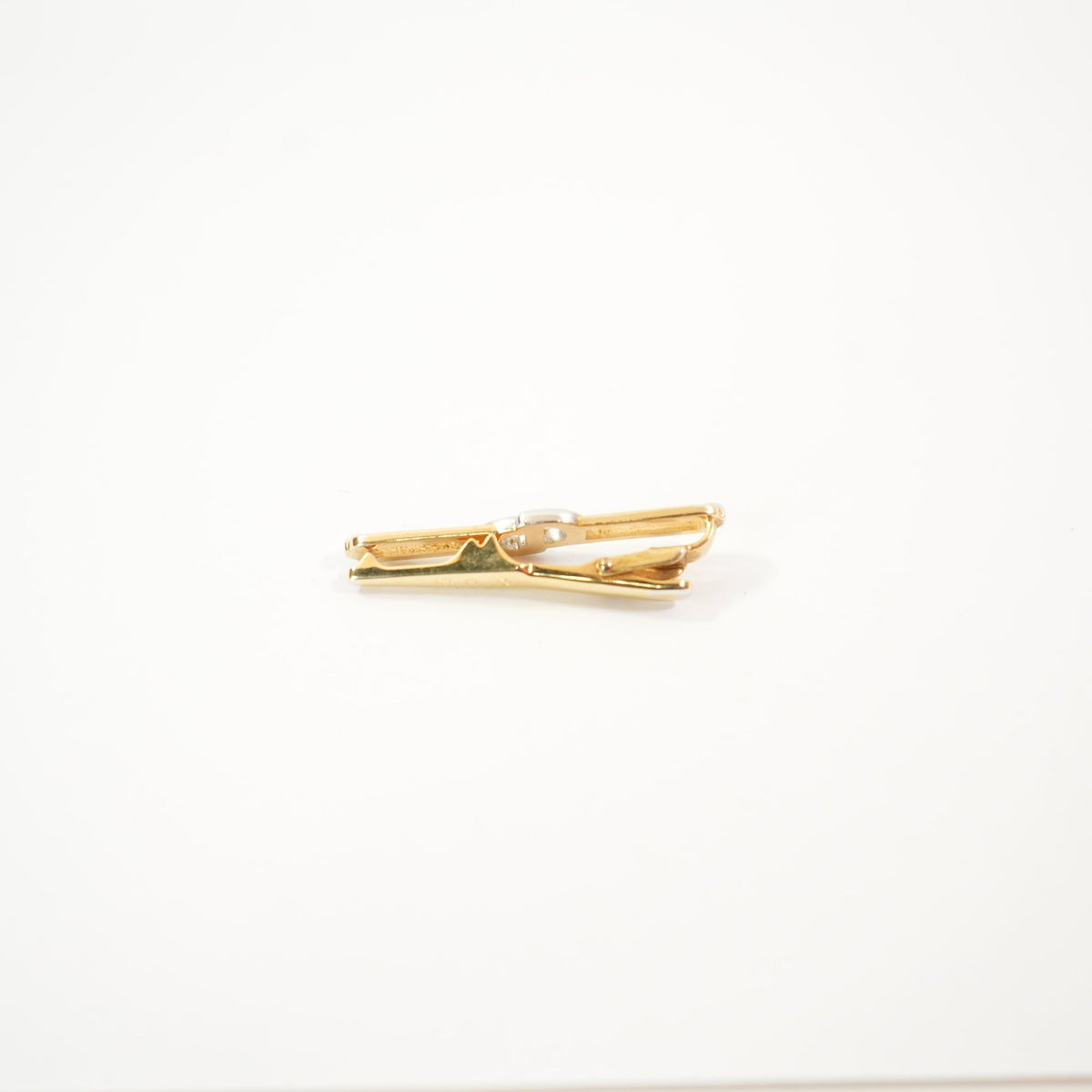 Christian Dior Interlocked two toned clip on brooch