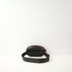 Gucci GG Marmont Torchon Belt Bag in black with a red trim