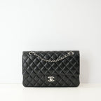 Chanel Double Flap Bag (Med)(Full Set) in black quilted lambskin with silver hardware