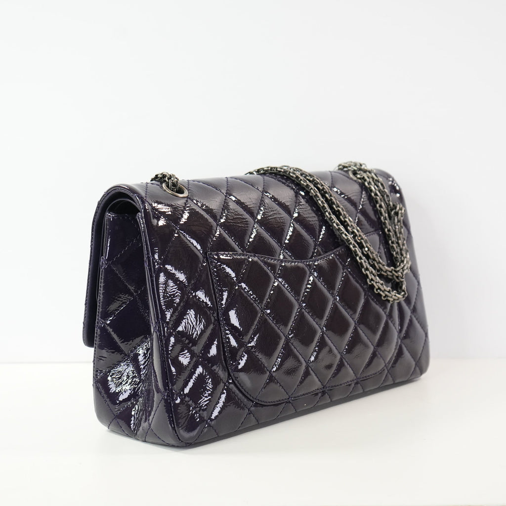 Chanel 2.55 Reissue in size 227 hadnbag in purple quilted patent leather (dustbag)