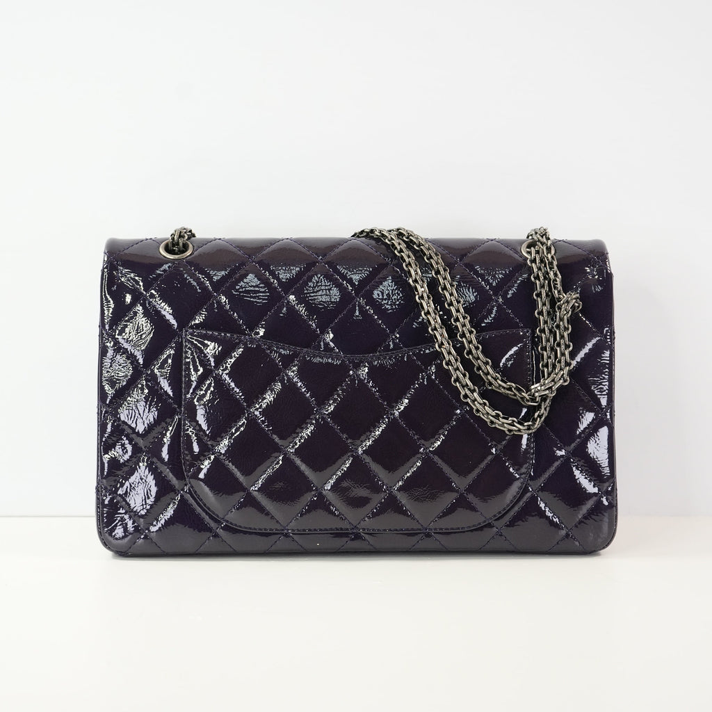 Chanel 2.55 Reissue in size 227 hadnbag in purple quilted patent leather (dustbag)
