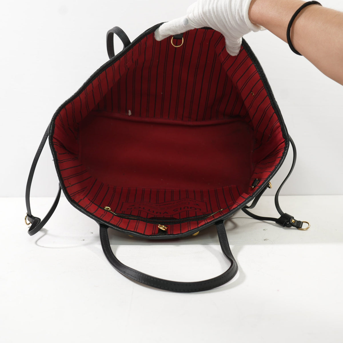 Louis Vuitton Damier Ebene Karakoram Neverfull MM with a Striking Red-and-White Zigzig