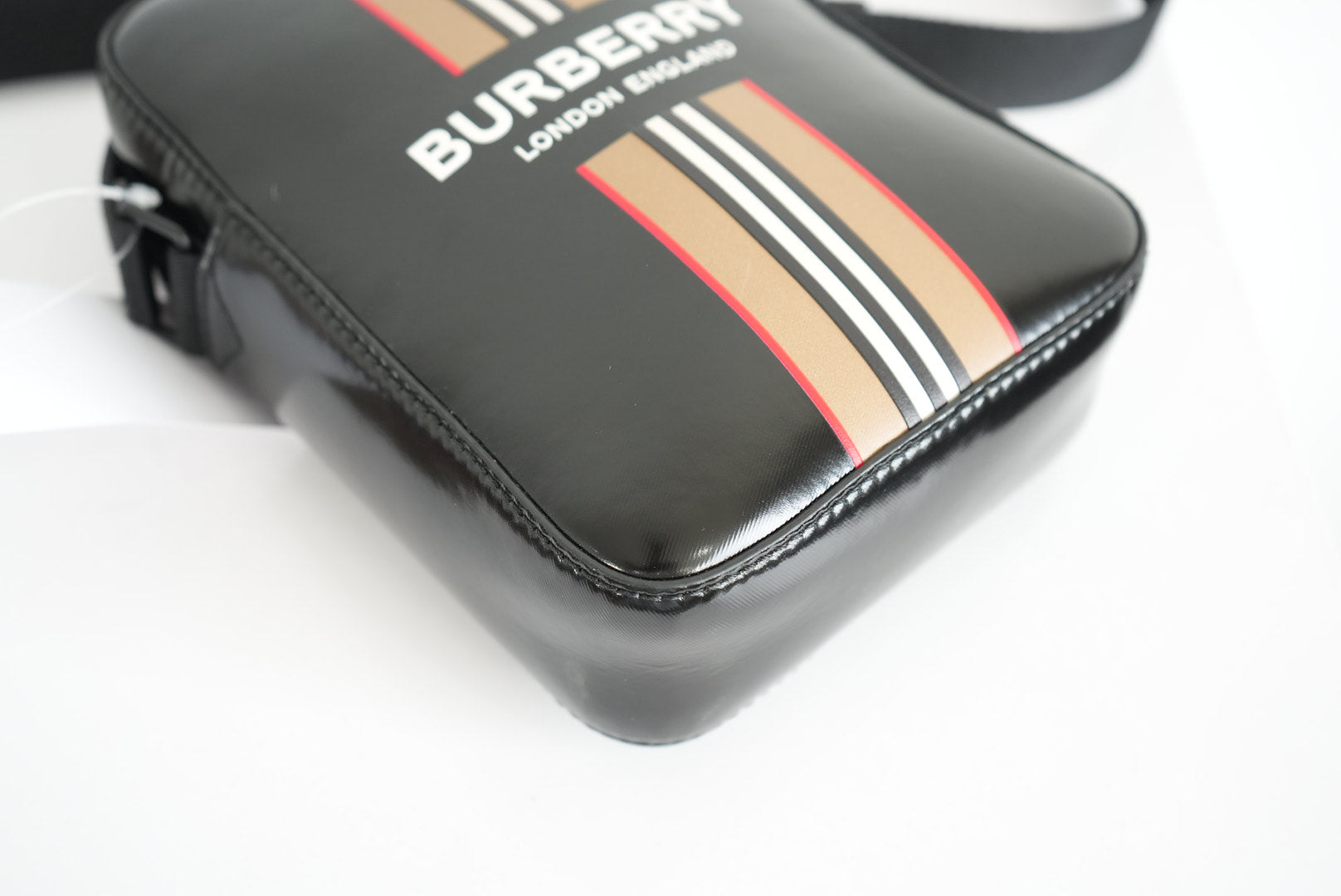 Burberry Thornton logo-stripe coated-canvas cross-body bag in black