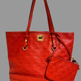 LOUIS VUITTON
Orient Monogram Empreinte Leather Citadine PM Bag