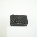 Chanel Classic Black Quilted Caviar Leather Jumbo Flap