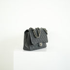 Chanel Classic Black Quilted Caviar Leather Jumbo Flap