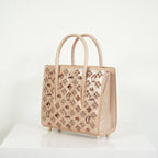 Christian Louboutin Paloa Mini Studded Leather Tote Bag in the Leche Colorway