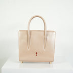 Christian Louboutin Paloa Mini Studded Leather Tote Bag in the Leche Colorway