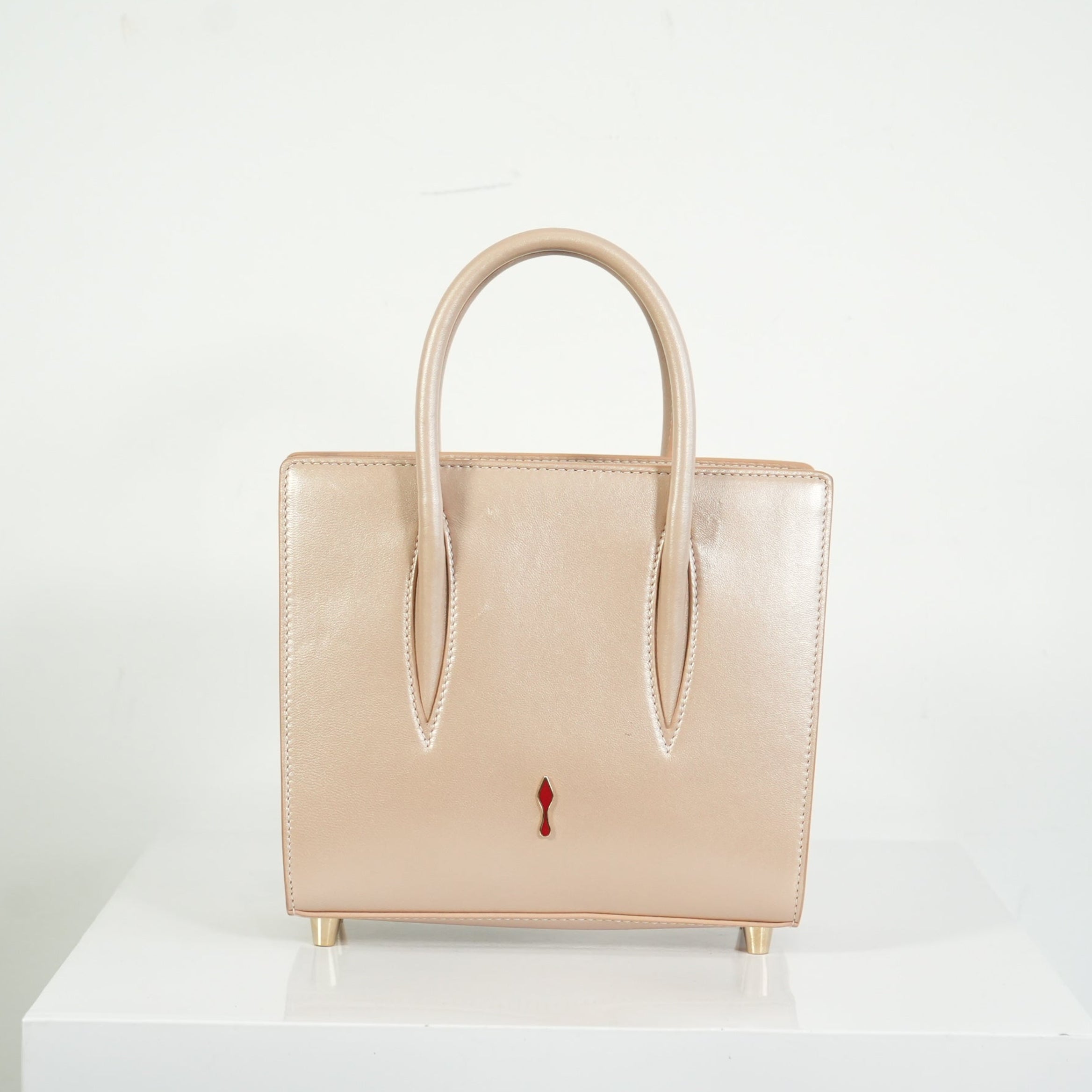 Christian Louboutin Paloa Mini Studded Leather Tote Bag in the Leche Colorway