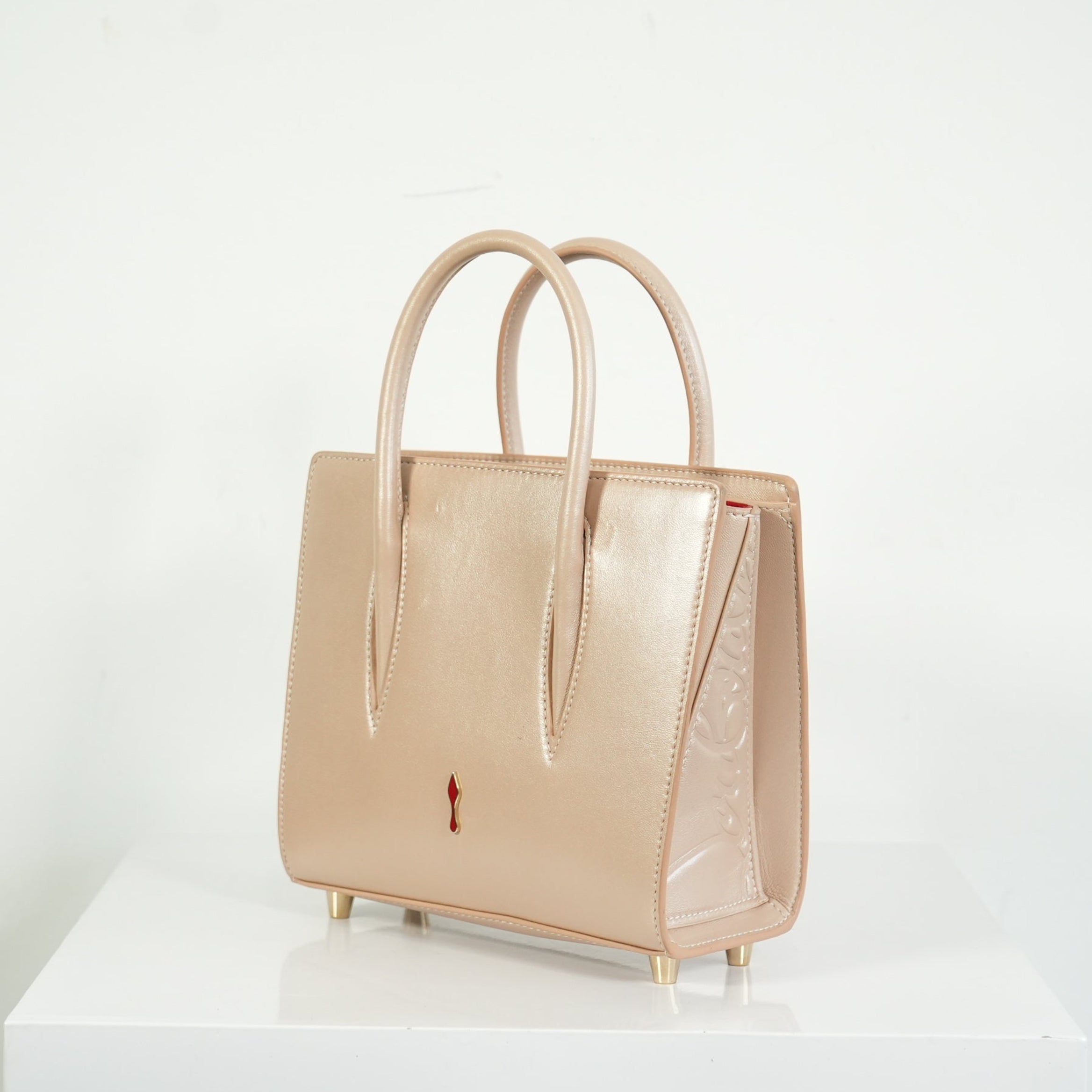 Christian Louboutin Paloa Mini Studded Leather Tote Bag in the Leche Colorway