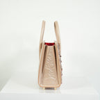 Christian Louboutin Paloa Mini Studded Leather Tote Bag in the Leche Colorway