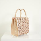 Christian Louboutin Paloa Mini Studded Leather Tote Bag in the Leche Colorway