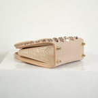 Christian Louboutin Paloa Mini Studded Leather Tote Bag in the Leche Colorway