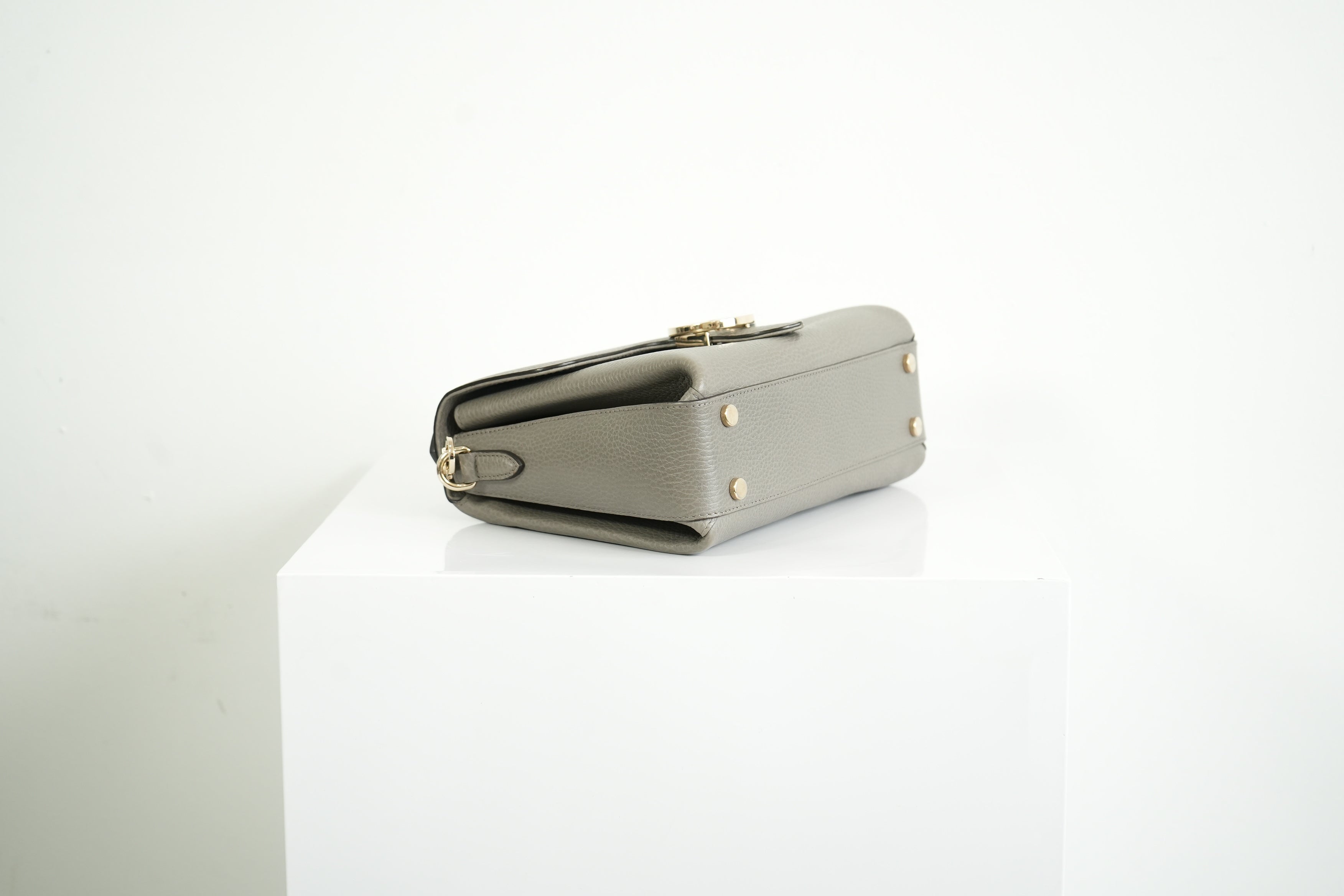 Gucci Interlocking G Grey Pebbled Leather Top Handle Crossbody Bag