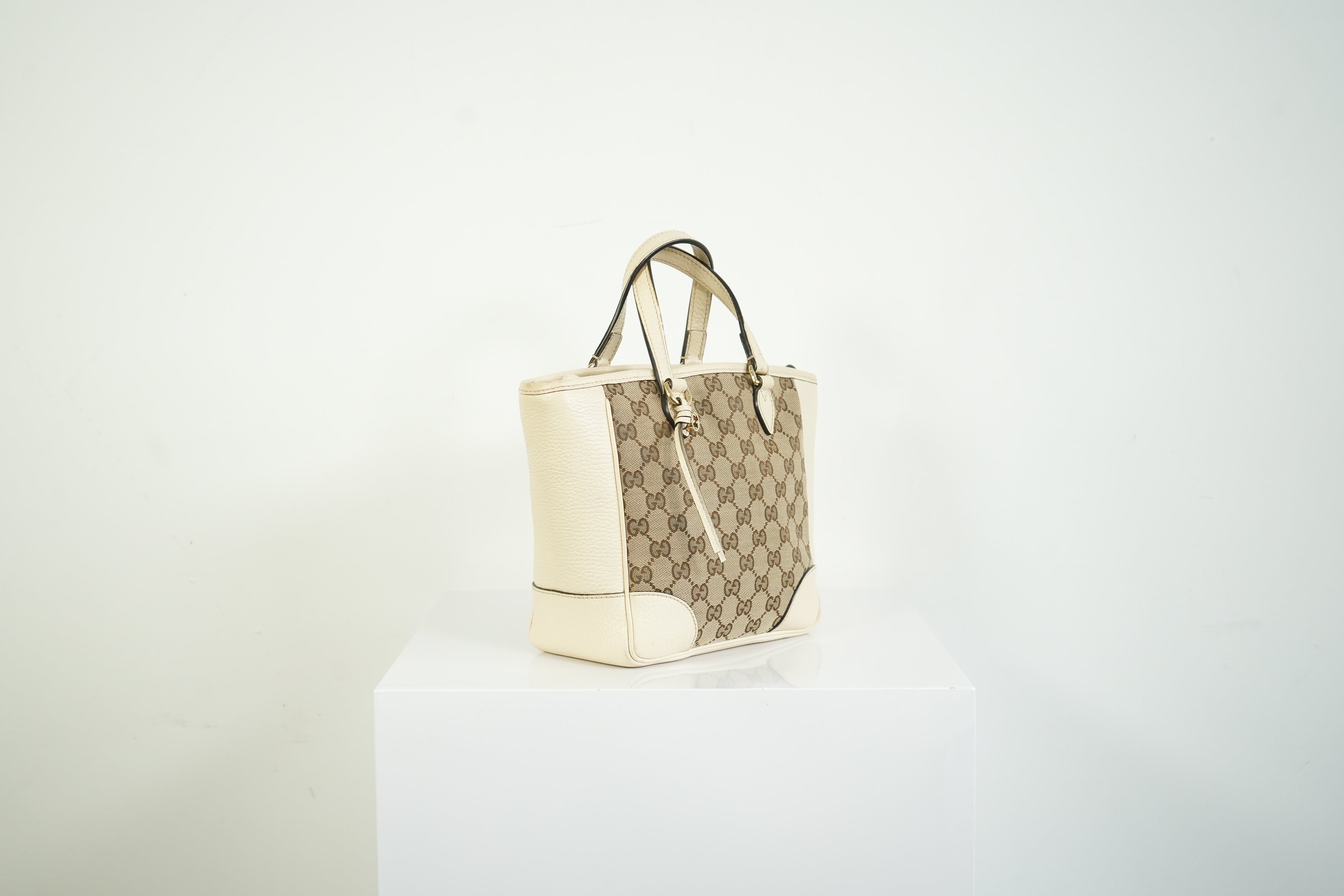 Gucci Bree GG Canvas Top Handle Bag Ivory Leather Crossbody Tote