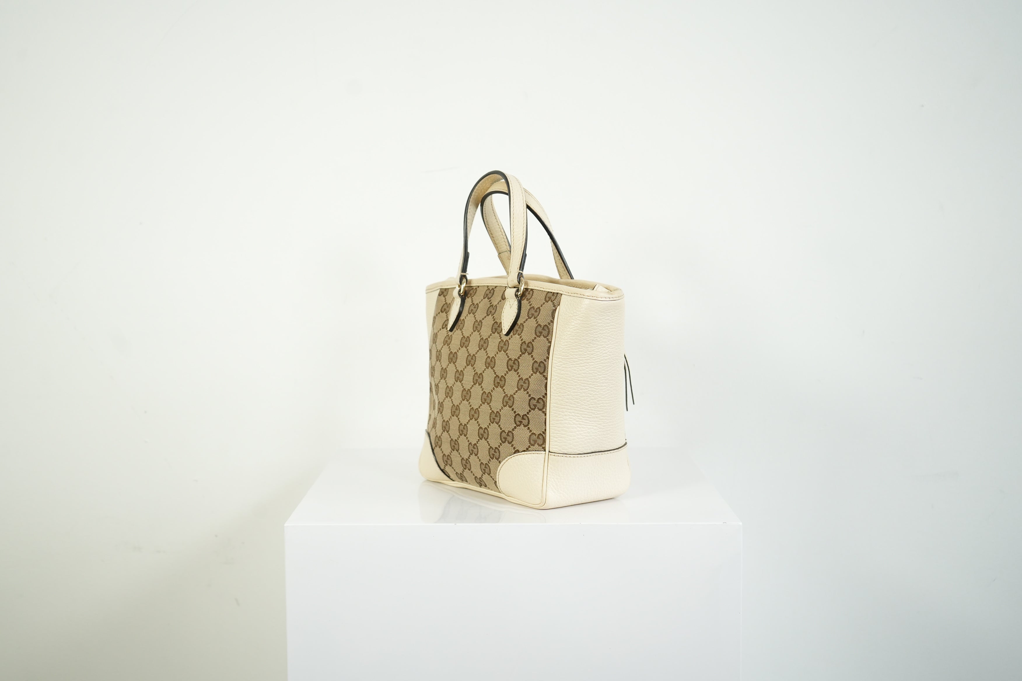 Gucci Bree GG Canvas Top Handle Bag Ivory Leather Crossbody Tote