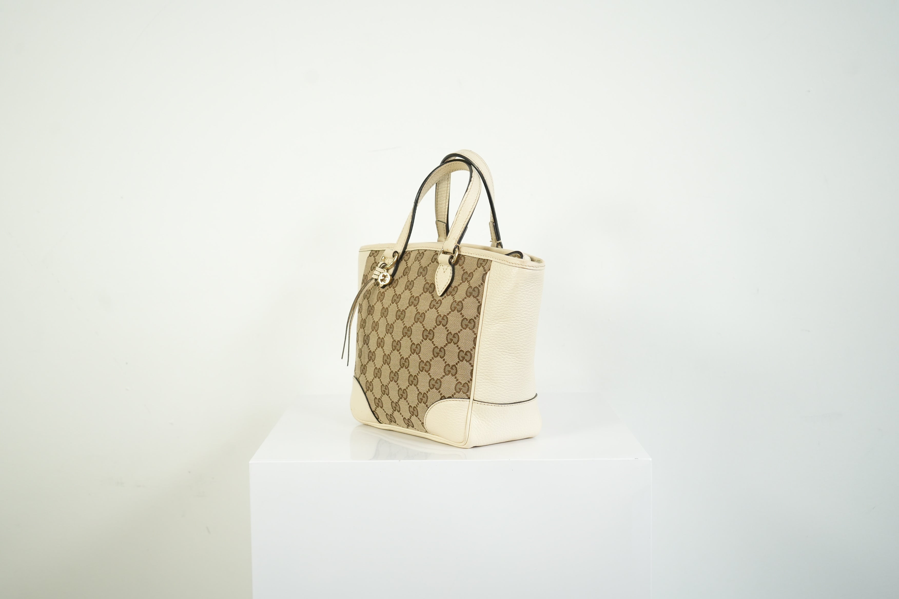 Gucci Bree GG Canvas Top Handle Bag Ivory Leather Crossbody Tote