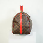 Louis Vuitton Keepall Bandouliere Monogram Canvas Duffle Bag Red Trim