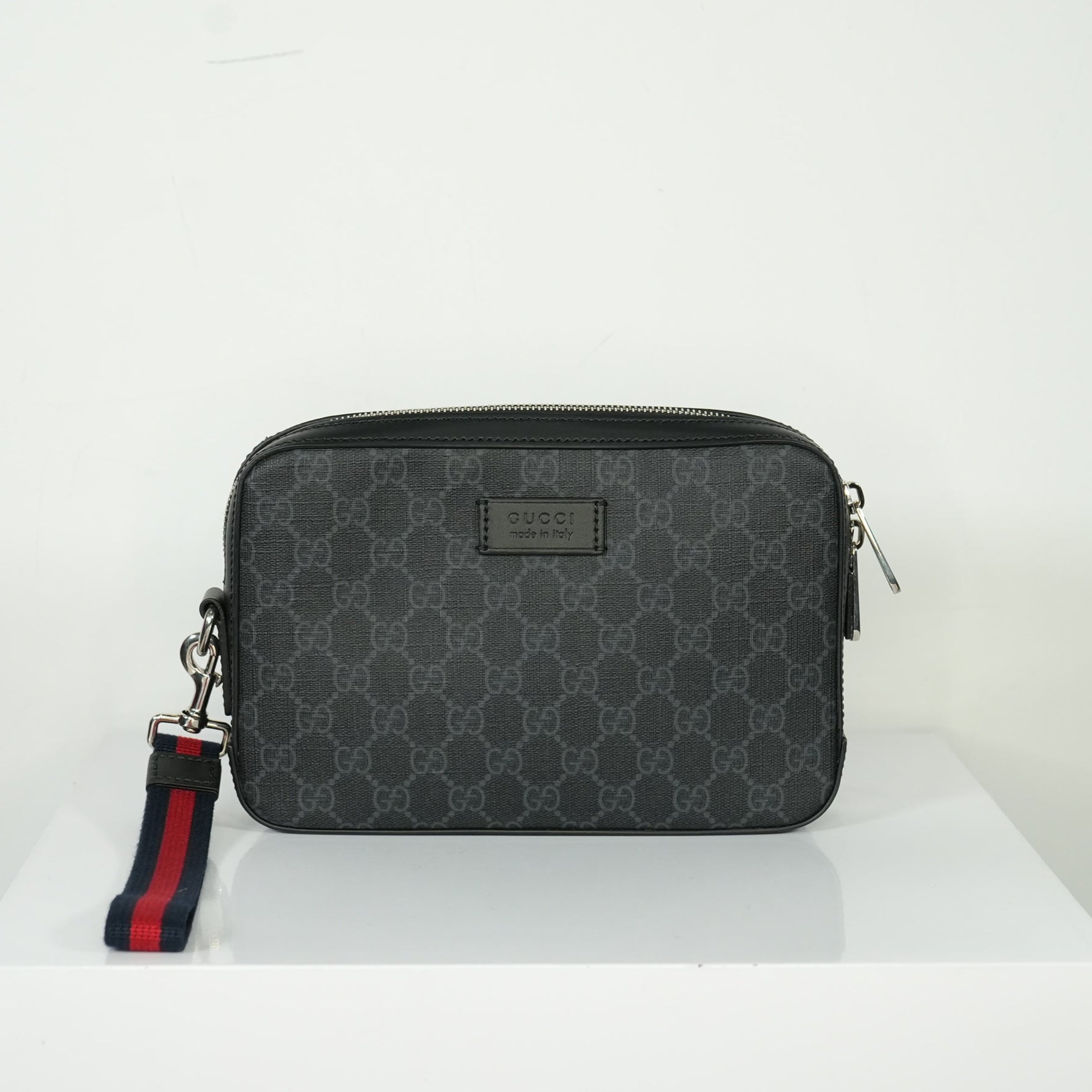 Gucci GG Black Supreme Clutch Bag