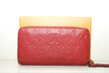Louis Vuitton Sarah Wallet in black Monogram Empreinte leather