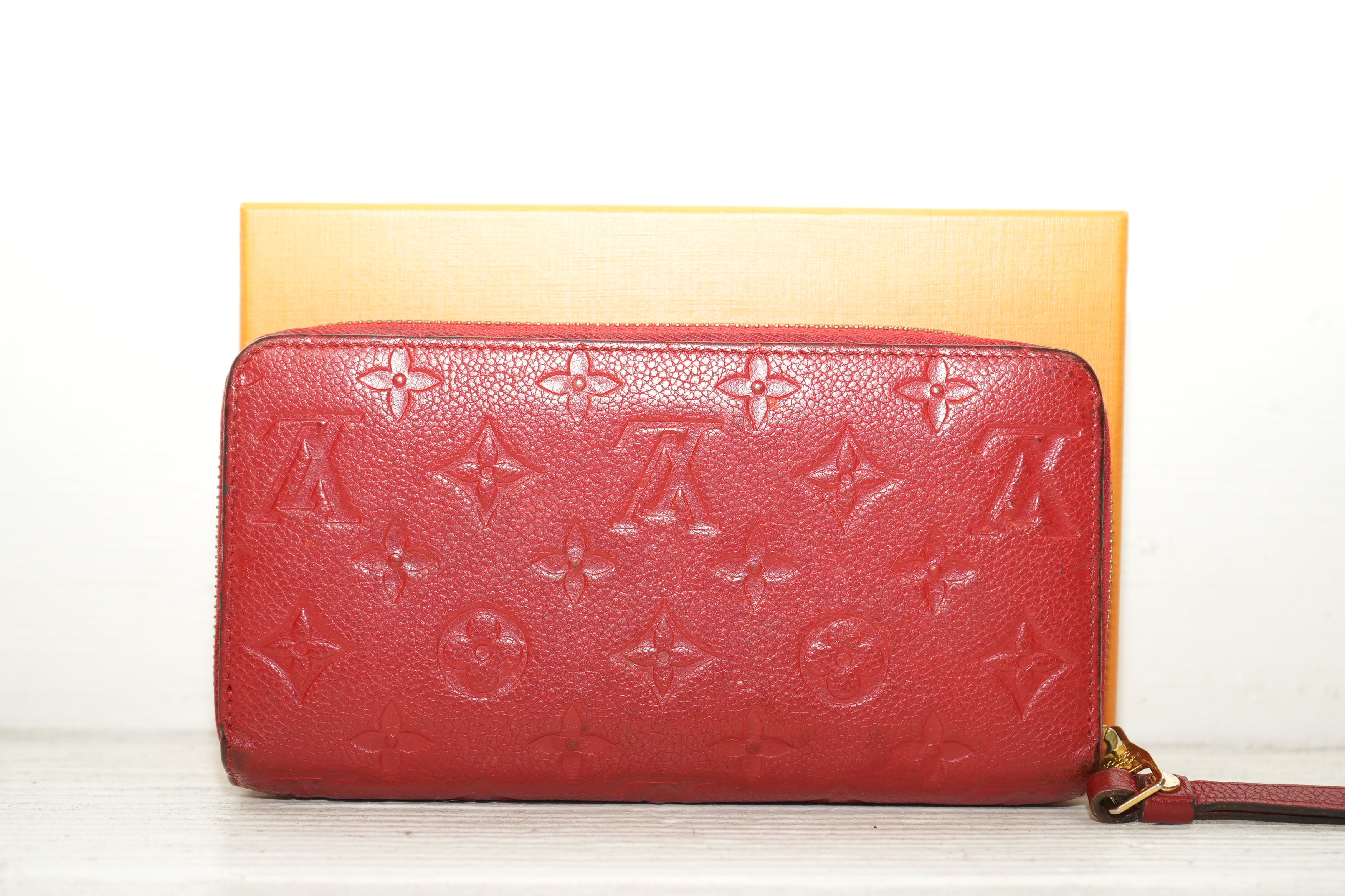 Louis Vuitton Sarah Wallet in black Monogram Empreinte leather