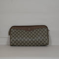 SF EXCLUSIVE: Gucci GG Supreme Monogram Canvas Clutch Tan Leather Trim