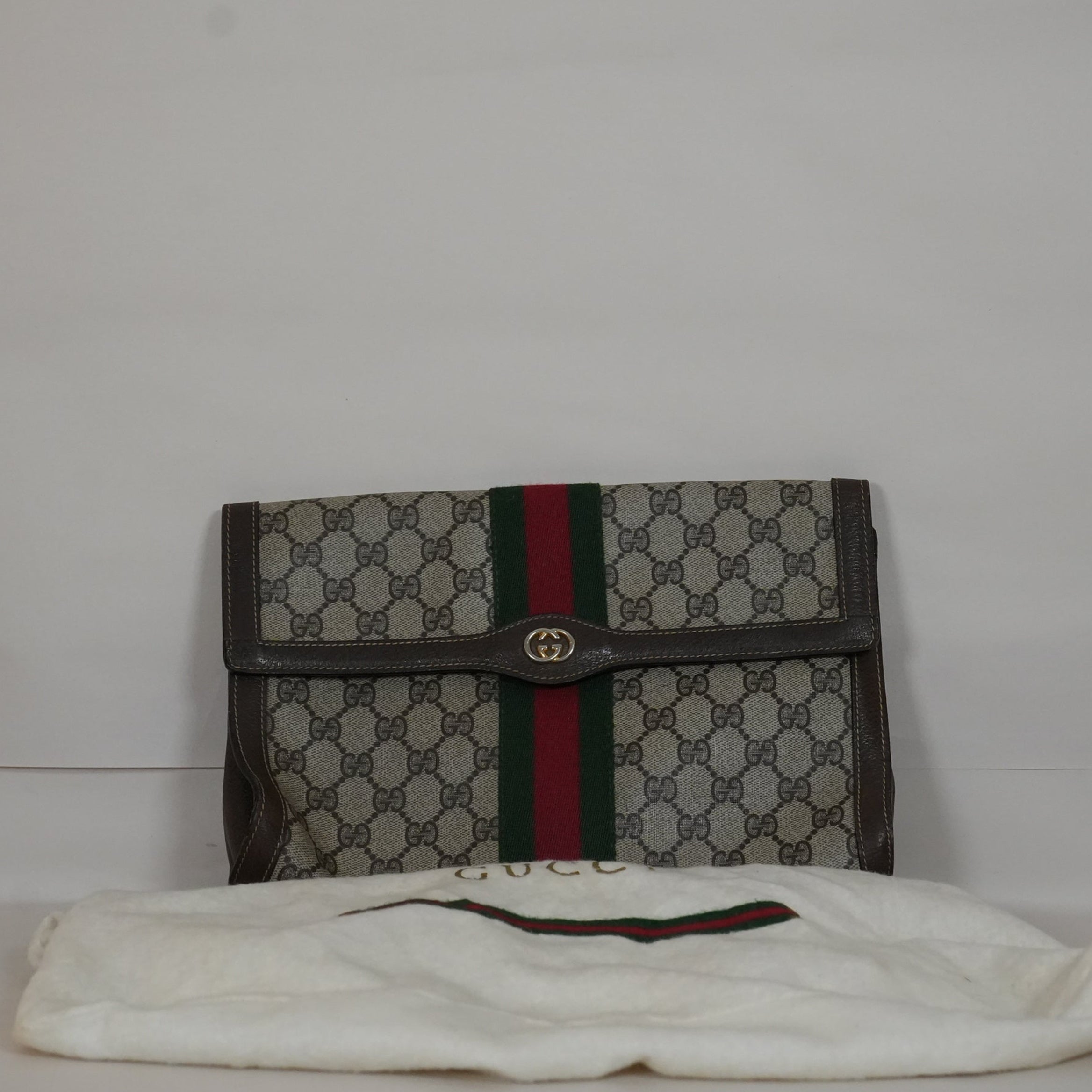 SF EXCLUSIVE: Gucci GG-Supreme Coated Canvas Clutch