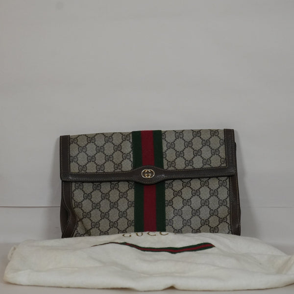 SF EXCLUSIVE: Gucci GG-Supreme Coated Canvas Clutch
