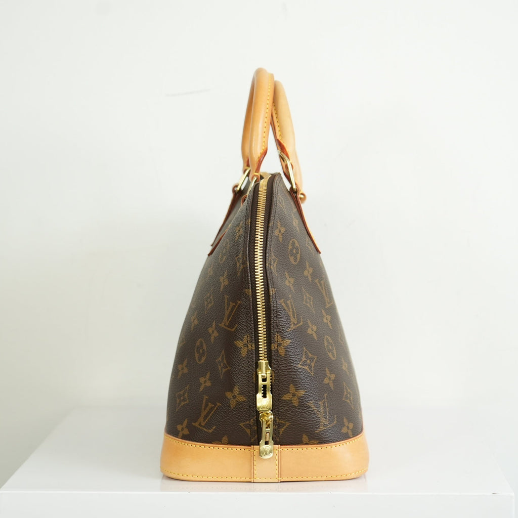 Louis Vuitton Monogram Alma PM Handbag