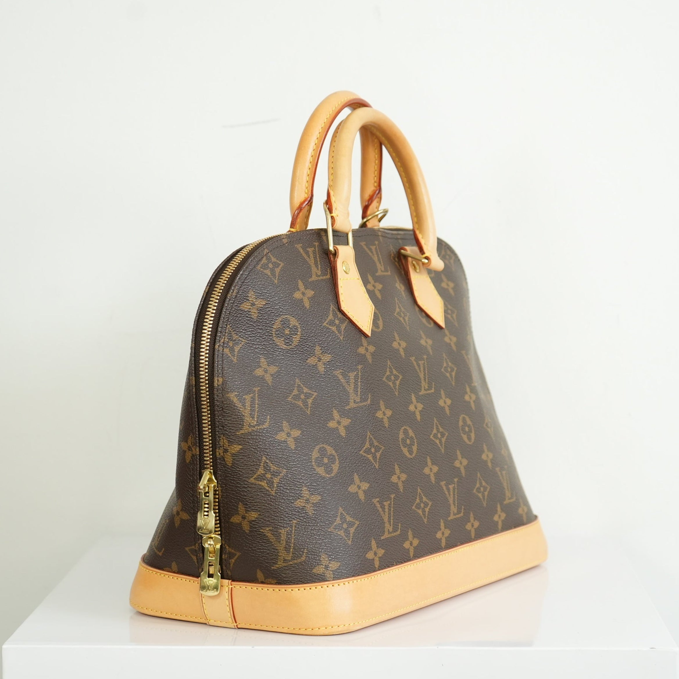 Louis Vuitton Monogram Alma PM Handbag
