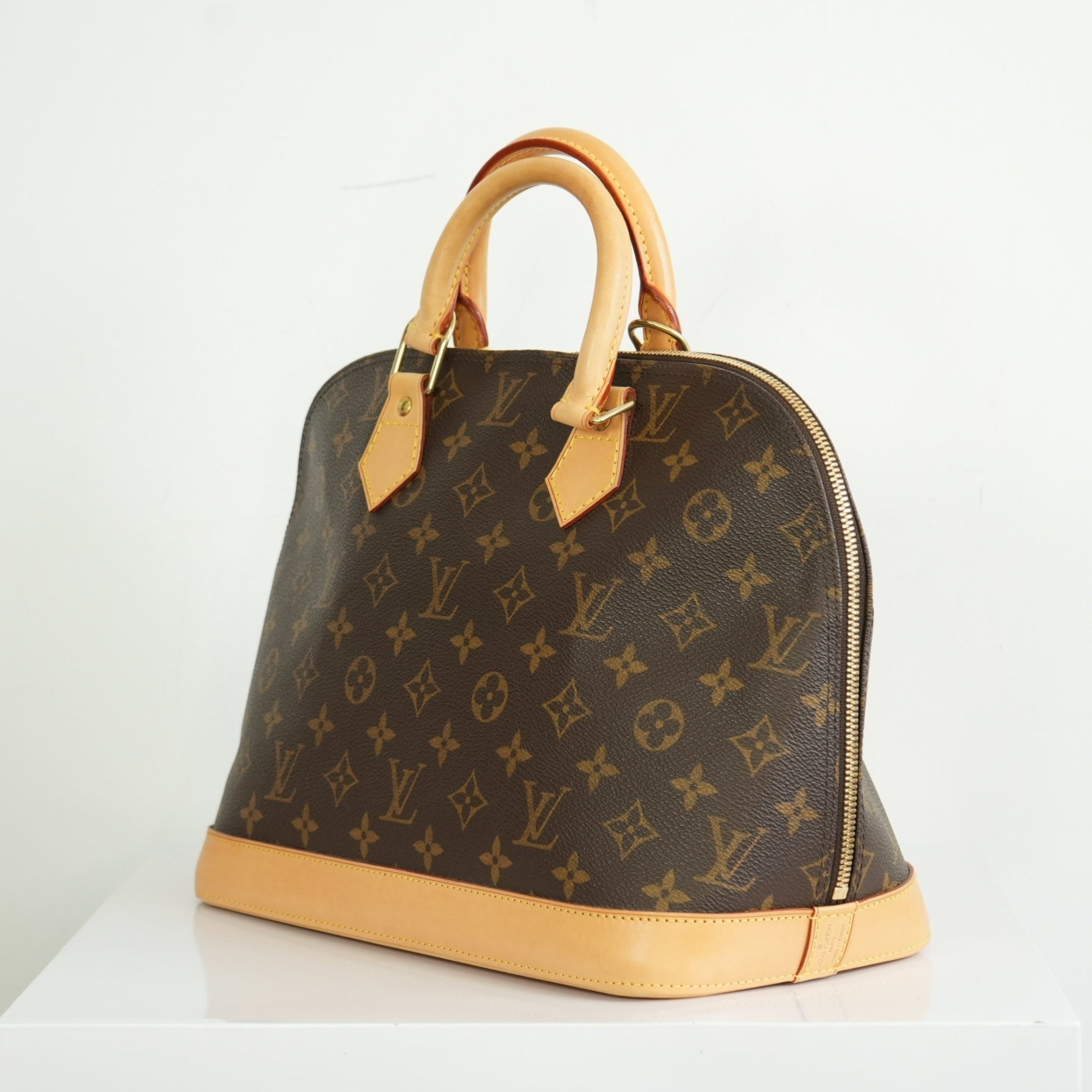 Louis Vuitton Monogram Alma PM Handbag
