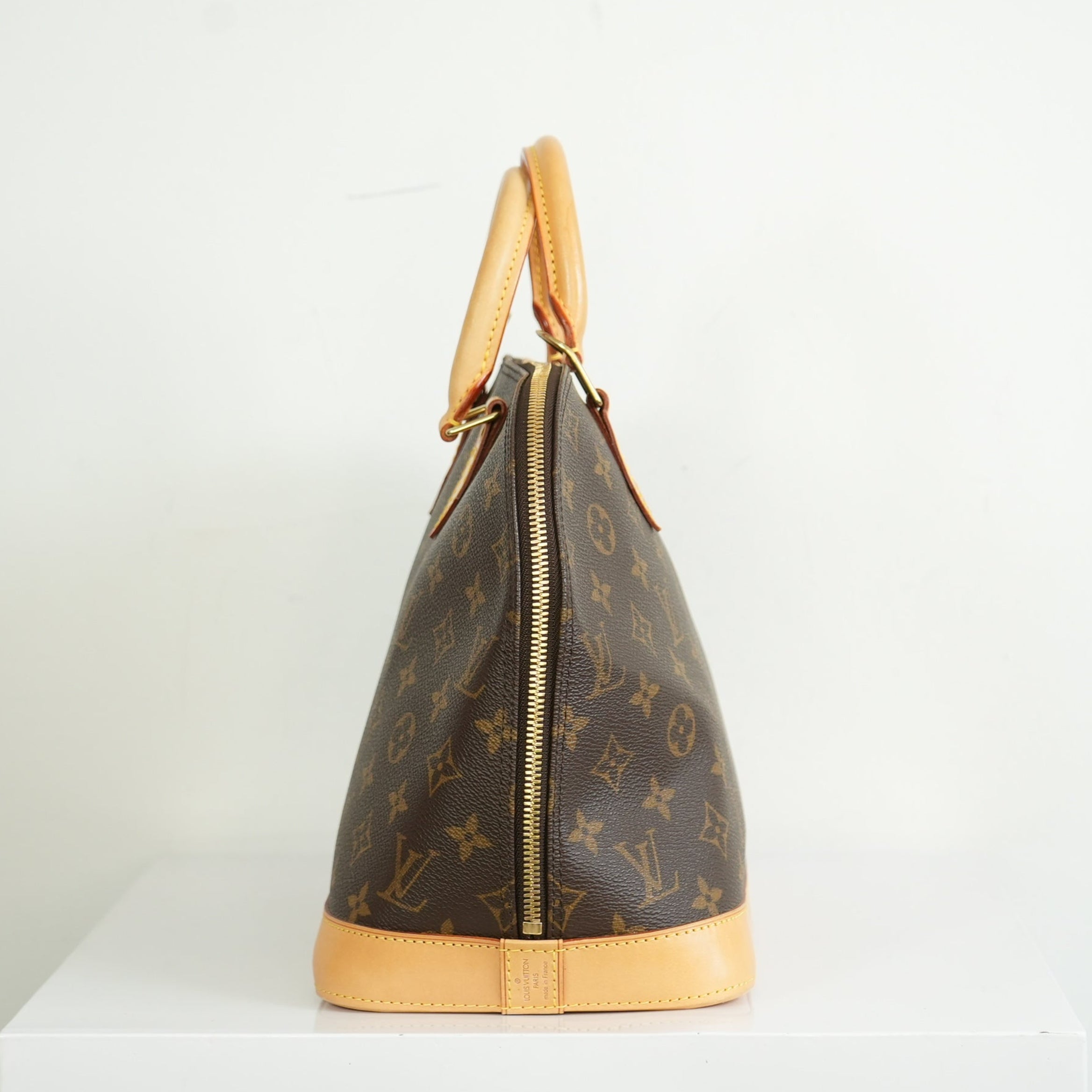 Louis Vuitton Monogram Alma PM Handbag
