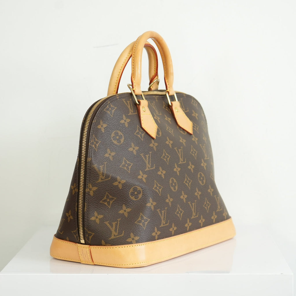 Louis Vuitton Monogram Alma PM Handbag