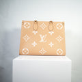 Louis Vuitton OnTheGo Empreinte Monogram Beige/Arizona Creme MM