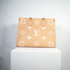 Louis Vuitton OnTheGo Empreinte Monogram Beige/Arizona Creme MM
