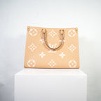 Louis Vuitton OnTheGo Empreinte Monogram Beige/Arizona Creme MM
