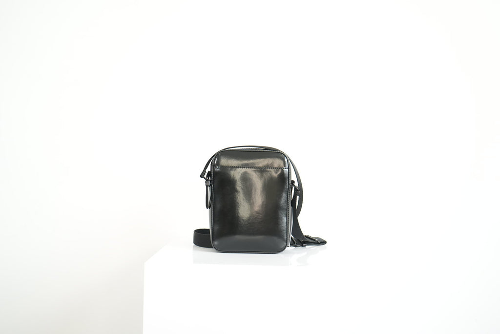 Burberry Thornton logo-stripe coated-canvas cross-body bag in black