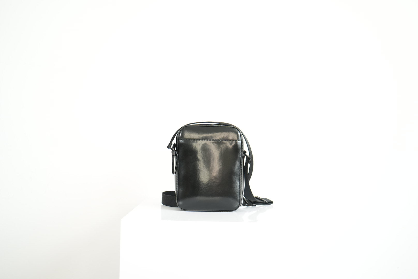 Burberry Thornton logo-stripe coated-canvas cross-body bag in black