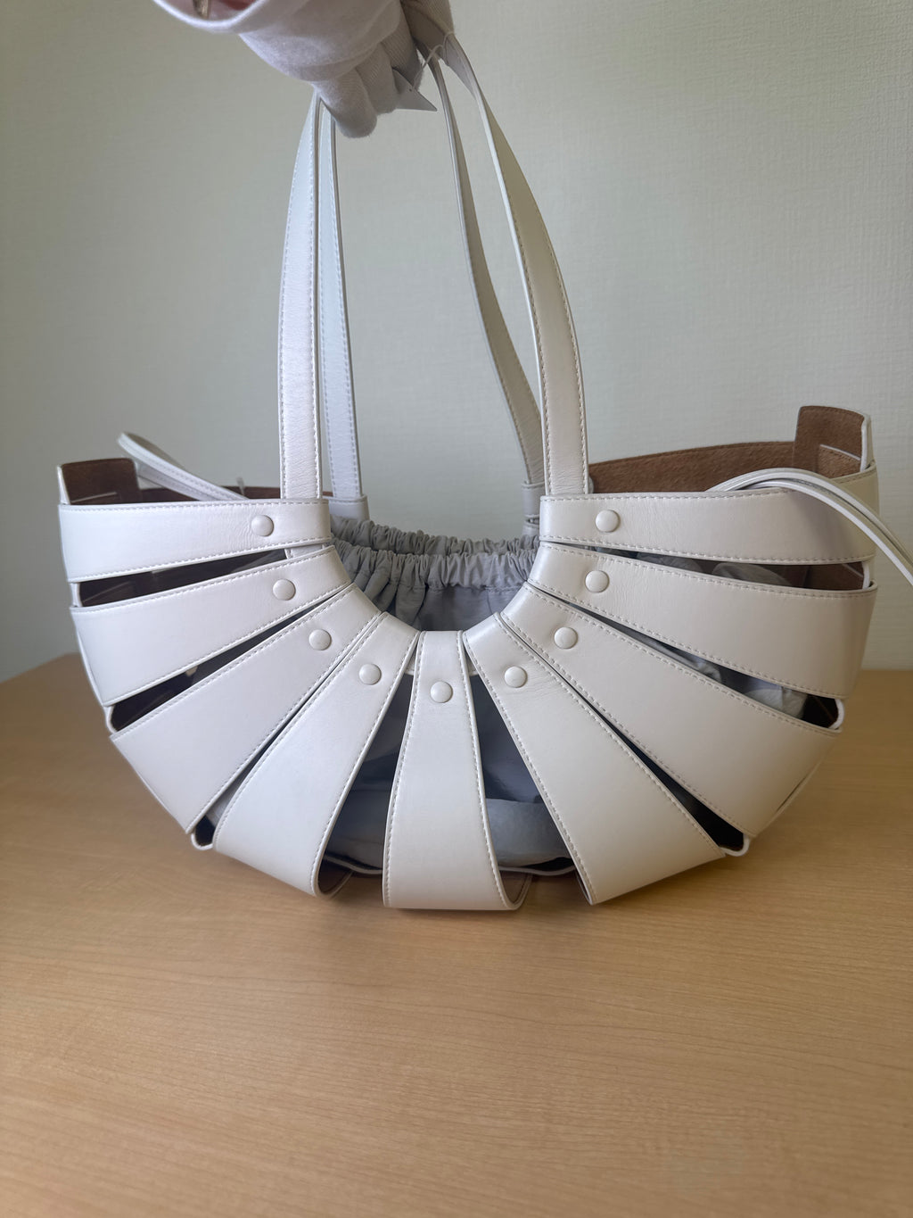Japan Exclusive: Bottega Veneta White Leather Cage Bucket Shoulder Bag with Grey Drawstring Pouch