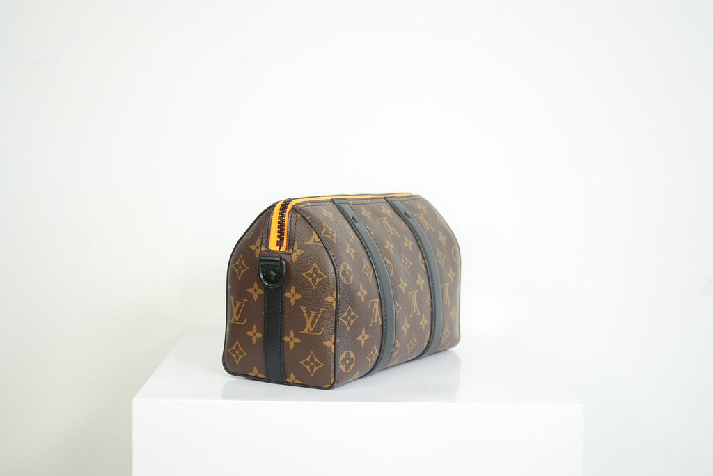 Louis Vuitton 2010 Macassar "Zoom w/Friends City" Keepall w/strap + dustbag